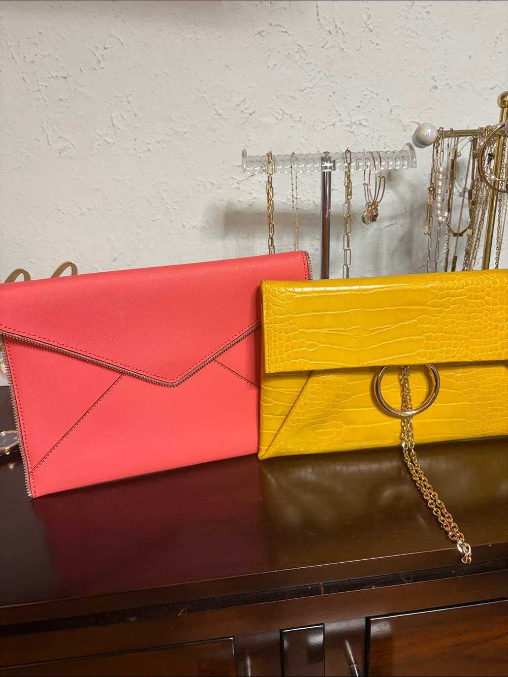 Yellow Croc-Embossed Envelope Clutch with Ring Chain and pink bag